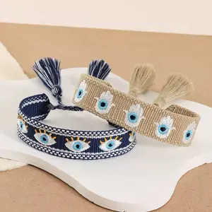 Evil Eye Woven Bracelet with Tassle - Style and Protection Handwoven with Detailed Embroidery Soft Tassels Multiple Colors Lightweight 0.03 lbs