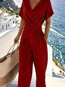 Women’s summer fashion solid-color asymmetrical short-sleeve two-piece set—simple, clean cut; versatile for everyday outings.