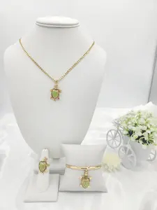 Beautiful 14k gold plated set with turtle pendant.  (45)