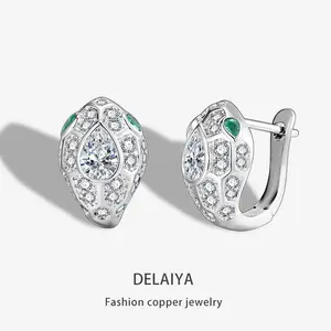 Inlaid Emerald Earrings, Niche High-End Style, Copper Material with Silver Pins, Exquisite Craftsmanship, Unique Design, Cool Minimalist Trend, Green-Eyed Snake Earrings
