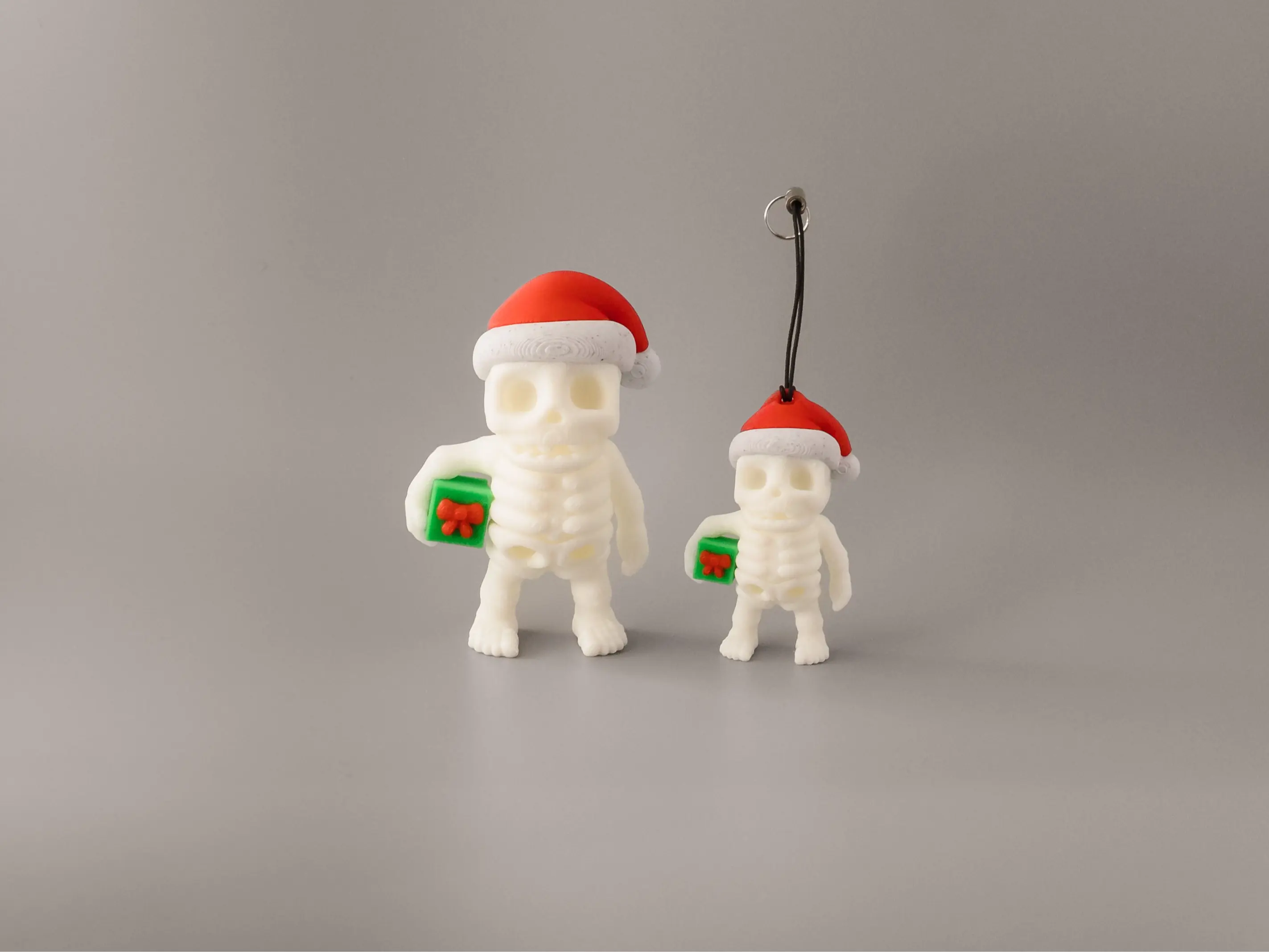 3D Printed Christmas Skeletons With Gifts