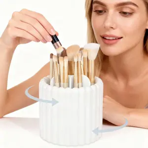 A set of 360-degree rotating makeup brush holder with 7 slots, makeup brush organizer, detachable rotating beauty brushes, pen holder; suitable for dressing tables, vanity cabinets, desks, etc.