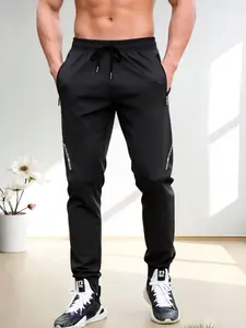 Men's Casual Loose Fit Sporty Long Pants, Quick-Dry Breathable Running Trousers, Drawstring Waist, Pockets, Spring & Fall