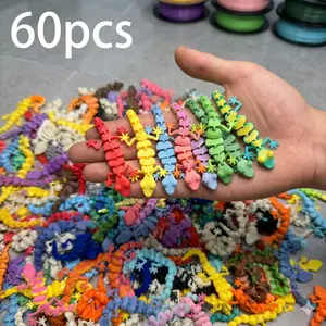 3D printed gecko figurines in 60 pieces, in various colors and ready for shipping. Suitable as gifts for Mother's Day, Teacher's Day, Children's Day and birthdays. print edgecko