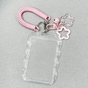Set of 1 transparent ID card holder keychain with cute star and bell charms; features a spring-loaded lanyard to prevent loss. Ideal as a gift for birthdays, graduations, or the start of the school year; perfect for office use, schools, and students.