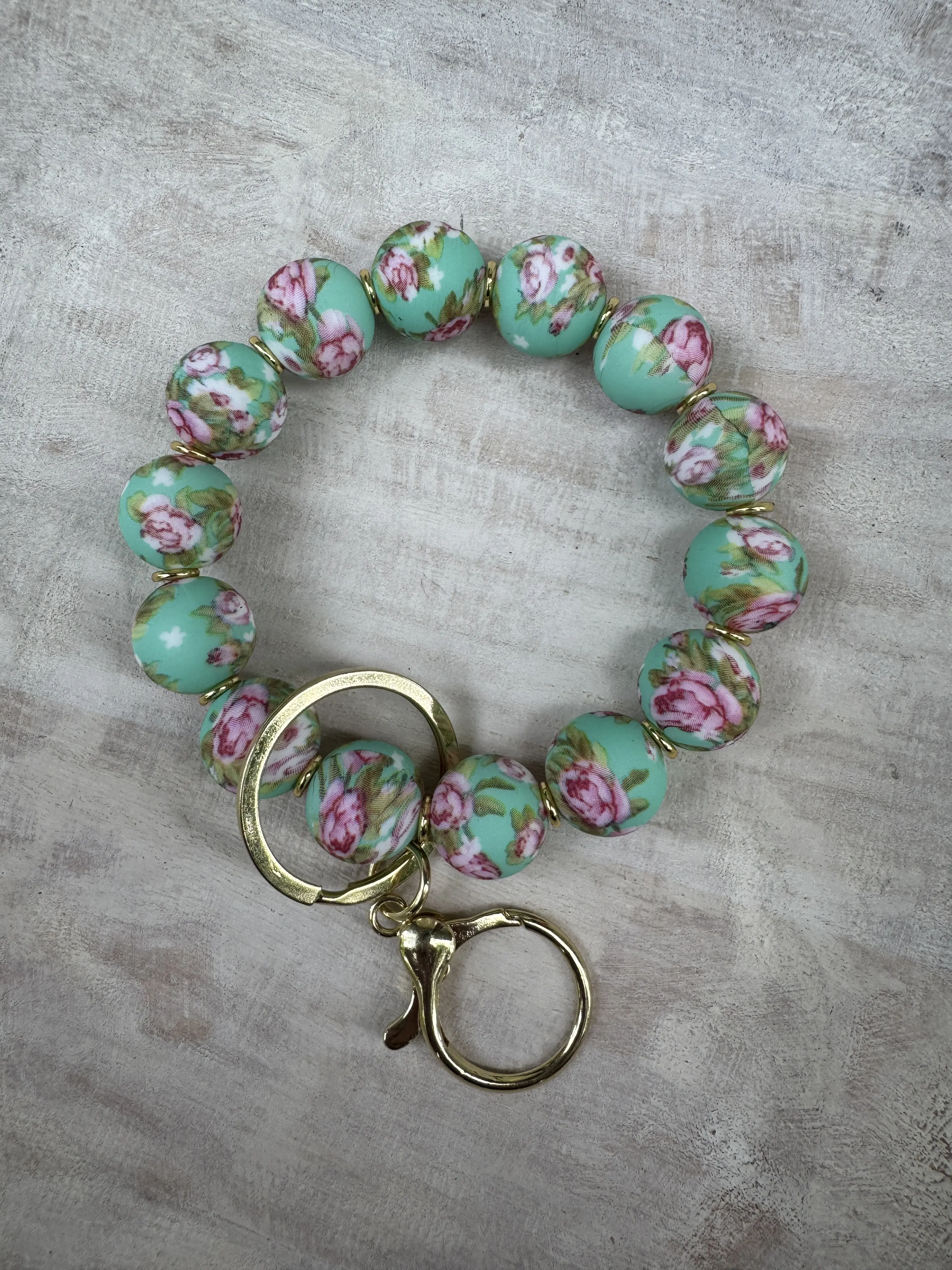 Garden Party Keychain Wristlet Teal with Floral Design and Gold-tone Clasp