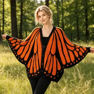 Butterfly Wing Knitted Cardigan -One Size Fits All- An aesthetically relaxed sweater with the ethereal wings of a monarch butterfly as the design, perfect for both festive and everyday wear.One Size Fits All