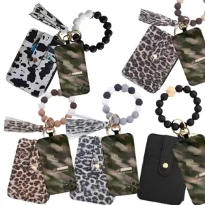 The jewelry-style keychain featuring beads with mobile phone links, along with keychain wallets, handheld purses, small card holder bracelets, bead key rings, and other accessories – a complete set of keychain Keychain Pendant