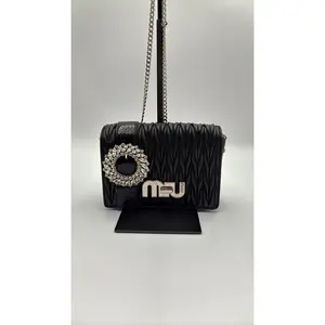 Pre-owned Leather Luxury Bags & Accessories Miu Miu Matelasse Crystal Buckle Flap Bag, Black Date Code: NODC05222613. Entrupy ID: .