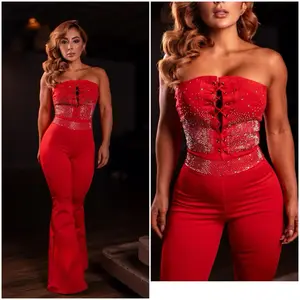 Elegante Colombian Jumpsuit Strapless Red Suplex Fabric with Rhinestone Accents and Flared Leg Design
