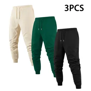 3-Pack Men's Solid Color Jogger Pants: Trendy Timeless Cut, Durable Fabric for Daily Wear, Adjustable Drawstring for Custom Fit (Snug/Loose), Elastic Cuffs to Prevent Riding Up, Roomy Pockets for Storage, Reliable Go-To Pants for Any Casual Occasion