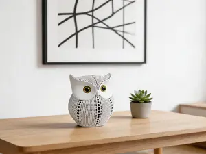 Handmade white polka dot bird figurine, modern decorative accent for shelves, desktops, living room and bedroom styling.
