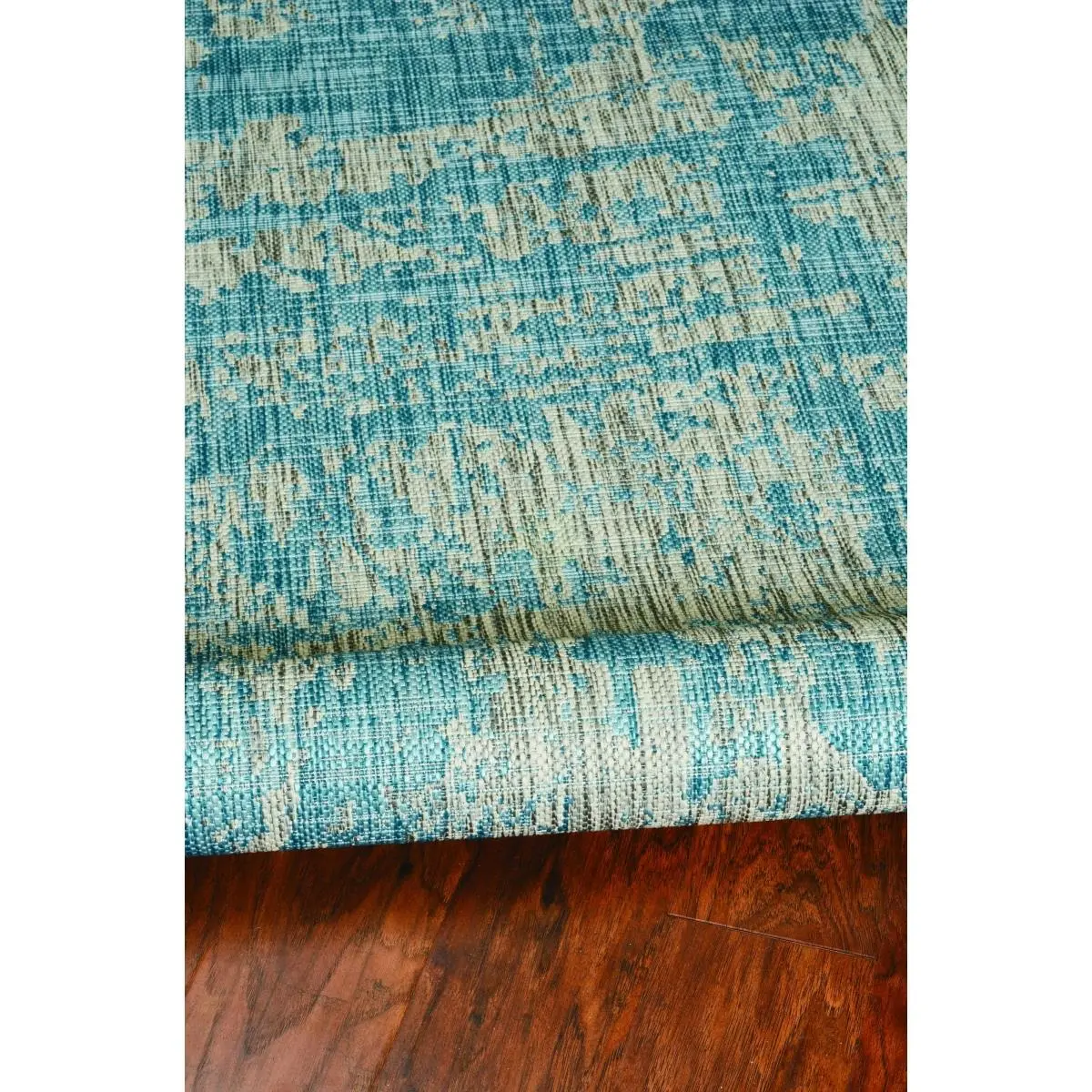 5 ft. 3 in. x 7 ft. 7 in. Teal Polypropylene Rug