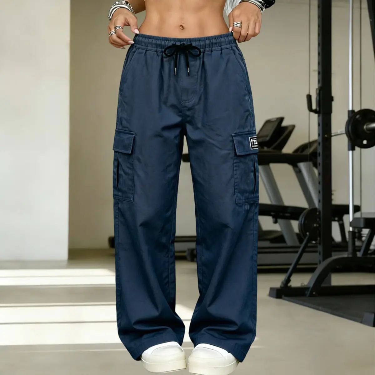 Streetwear essential polyester fiber women’s cargo pants for all seasons, made from high-quality polyester that retains a good shape.Elastic drawstring waist and multi-pocket design showcase classic street style, suitable for countless casual everyday occ
