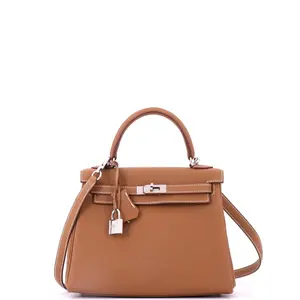 Pre-owned HERMÈS Leather Top Handle Bags Hermes Kelly Handbag Gold Togo with Palladium Hardware 25 by Rebag