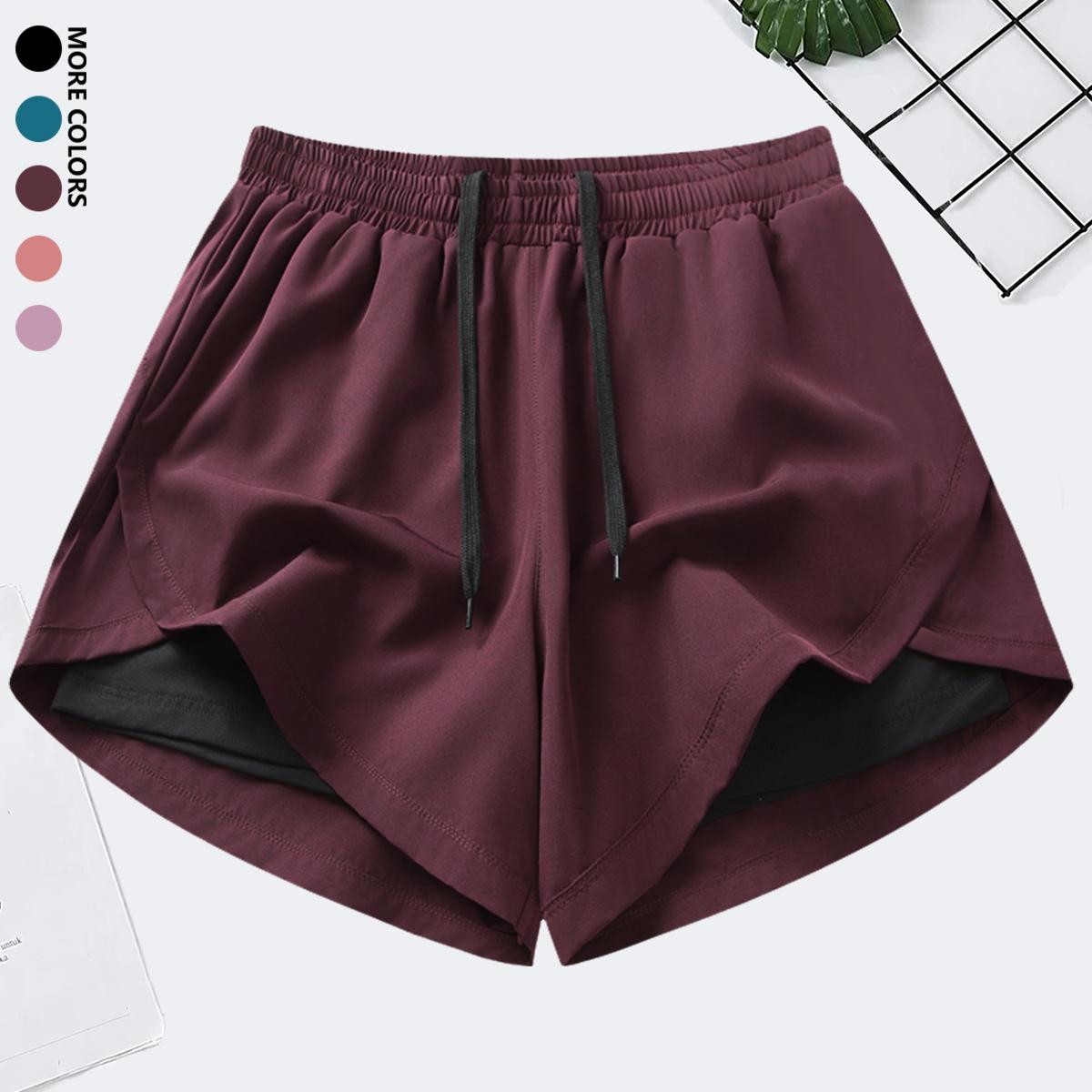 Women’s casual sports yoga shorts with elastic waistband and quick-dry fabric; suitable for running and gym workouts. Women’s athletic shorts/casual shorts/fitness shorts; faux two-piece running shorts; women’s gym training pants; anti-exposure women’s sh