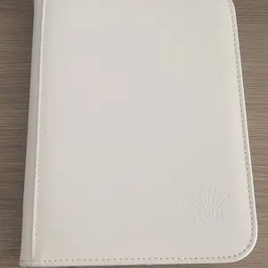 Auri Whiteout 4 Pocket TCG Card Binder White Smooth Zipper Closure  High-Quality Card Pages Compact Lightweight Sleek Design for Pokmon One  Piece Sports Cards Holds 160 Cards PVC-free Acid-free Pages - TikTok