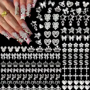 128 PCS Silver Nail Charms, Nail Gems Silver Rhinestones for Nails 3D Butterfly, Bow, Star,Crown,Cross,Dollar,Heart Shapes Y2K Accessories Nail Decor (17 Styles)