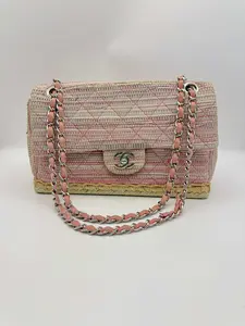 Pre-owned CHANEL Handwoven raffia + quilted texture — this under the radar crossbody is the ultimate niche luxury flex