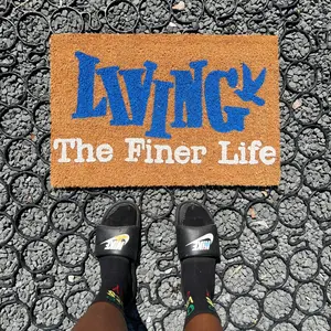 LIVING THE FINER LIFE MAT