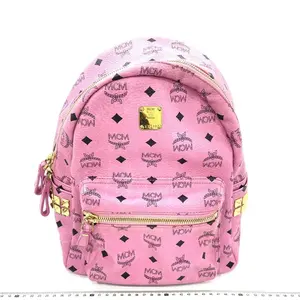 Pre-owned MCM canvas Backpacks Pink Backpack with Gold Hardware and Logo Pattern
