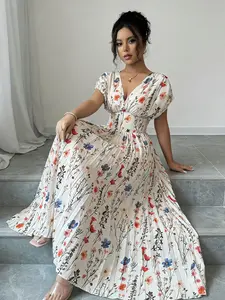 A fashionable white background pleated skirt with colorful floral prints for women. The colorful floral prints make it lively, and the pleated skirt is elegant and suitable for commuting to work, shopping, and outdoor wear