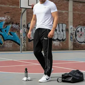 Men's Casual Sporty Long Pants with Elastic Cuff - Loose Fit Comfortable Lightweight Fabric Fashionable Print Design Perfect for Daily Wear Outdoor Activities Jogging Gym Workout Breathable Stretchable Athletic Trousers