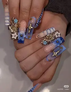 Yellen Luxury Nail Art with Floral and Star Design, Blue and Gold Colors, Perfect for Special Occasions