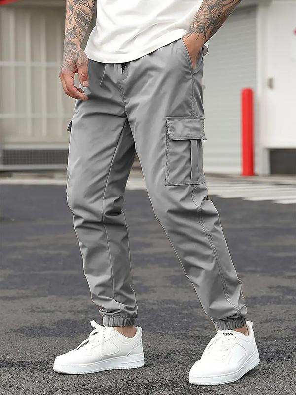 Men's durable work pants with multiple pockets; outdoor sports pants; cargo pants with drawstring design; tapered men's pants; machine washable; holiday gift.