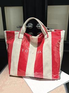 transparent pvc striped tote bag, fashionable letter printing, casual and versatile large-capacity handbag, transparent texture, first choice for daily travel, suitable for students, office workers, short trips