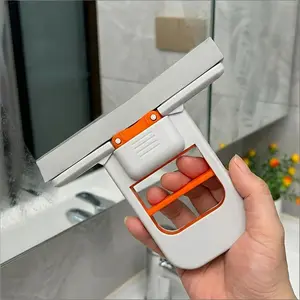 This multi-functional mini handheld mop features a telescopic and foldable design, is a no-rinse desktop cleaner, and offers quick cleaning. Ideal for home, office, bathroom, kitchen, wet and dry use, and car window cleaning.