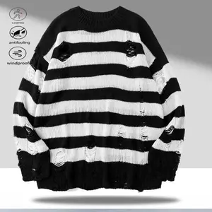 A striped, openwork crewneck sweater with a casual, versatile style; the crewneck design is practical and easy to pair with other items. The overall design is slimming, and the classic red and black colorway adds timeless appeal. The strategic hole det