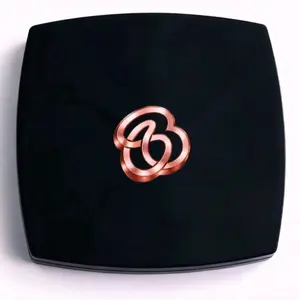 Suga Reflection Mirror with Rose Gold Logo and Sleek Black Design