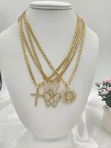 Spanish women link chain with different charms, 14K gold plated.