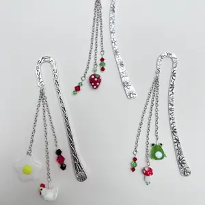 Whimsical Cottage Core Metal Bookmarks! Carefully crafted with the love of crystal and glass beads to make the perfect reading companion!