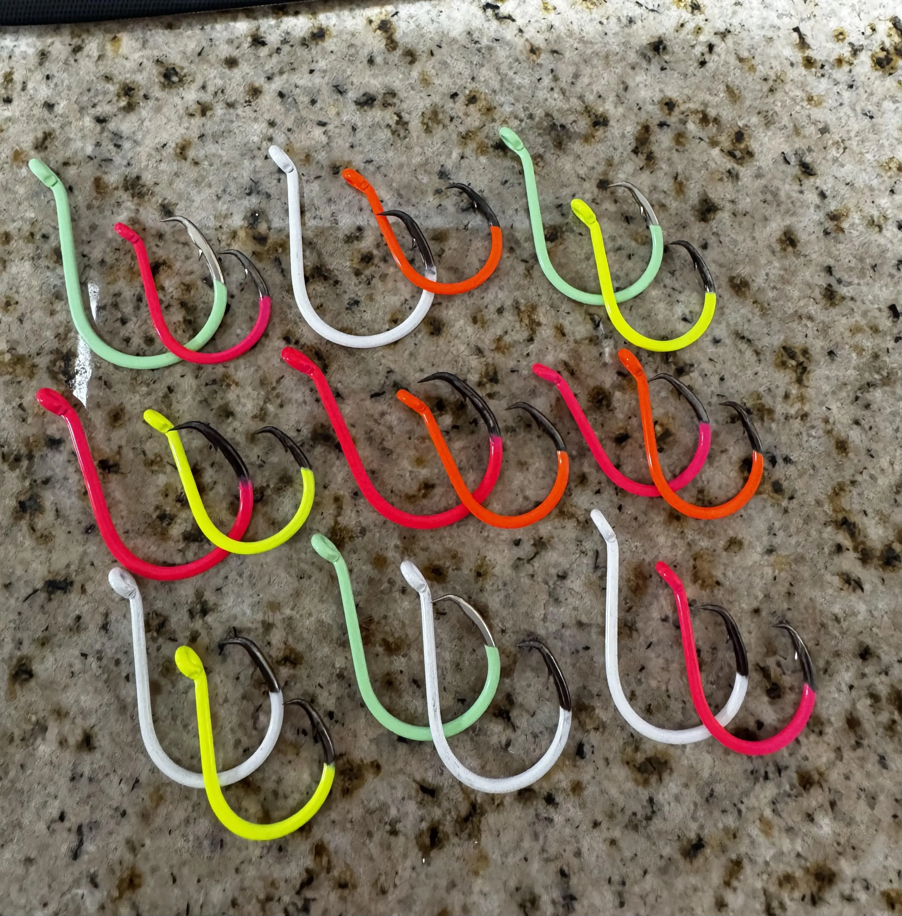 Hooks! Six hooks per pack.  Pre-packed in various hook colors and hook sizes