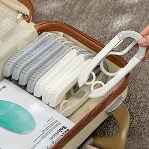 4pcs of hanging clothes artifact, easily folded and thin, easy to store in luggage or bag. --The anti slip tooth pattern design firmly fixes clothes, with strong load-bearing capacity, making it an ideal choice for travel, renting, and organizing clothes
