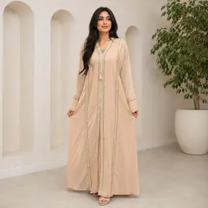 Abaya - Elegant Black Long Sleeve Dress with Tassel Detailing and Flowing Fabric for Special Occasions