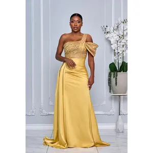 COUTURE-INSPIRED BEADED BODICE ONE SHOULDER GOWN WITH SIDE TRAIN