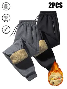 Uni-sex warm fleece-lined ankle jogger pants set, featuring a simple fashion style with side letter zipper accents; windproof, durable, fleece lining keeps feet warm and cozy, perfect for men and women during fall/winter outings and dates