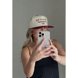 Husbands Tab Trucker Hat