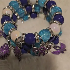 Purple and Blue Beaded Bracelet with Butterfly Charms and Glitter Accents