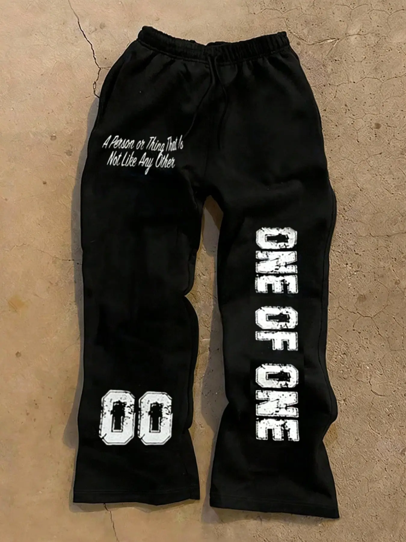 "ONE OF ONE" Graphic Print Flared Sweatpants Y2K Streetwear Men Women, Vintage Washed Cotton Elastic Waist Drawstring Pants, 00 Print Slogan Loose Fit, Casual Loose Baggy Lounge Pants, Casual Fit Drawstrings, Casual Stylish Clothing