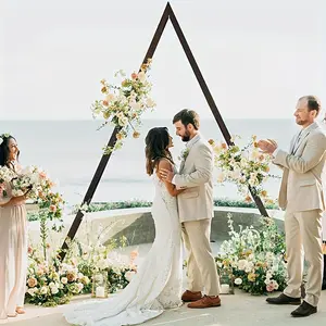 A wooden wedding arch set, 8.2 ft tall triangular wedding arch (with support poles), made from natural wood for garden weddings and parties, ideal as a decorative arch.