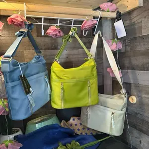 Medium triple zipper crossbody bags