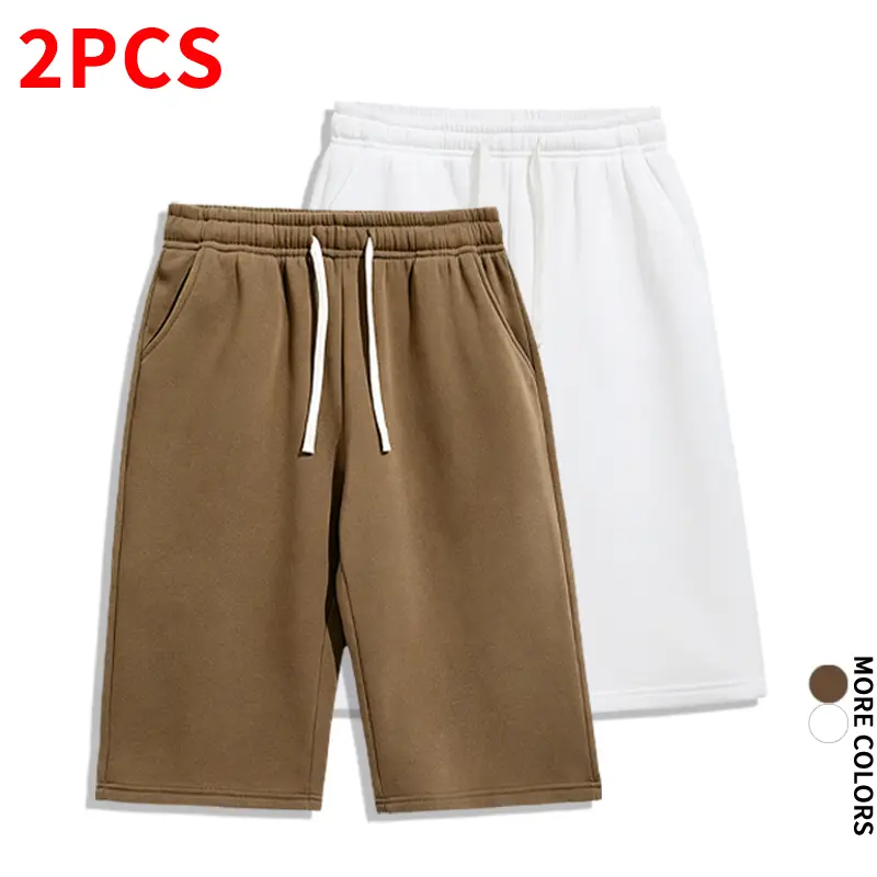 Set featuring knit athletic seven-eighths-length shorts with a loose fit and elastic waistband with drawstring; streetwear pants for everyday summer workouts.