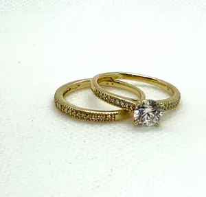Elegant 14k Gold Laminated Wedding Rings with Center Stone for Couples