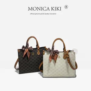 Monica Qiqi Commuting Light Luxury High-End Handheld Monogram Print Single Shoulder Crossbody Tote Bag for Women 2026 New Model