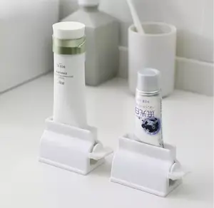 Toothpaste Tube Squeezer Rolling Dispenser Stand Holder for Bathroom