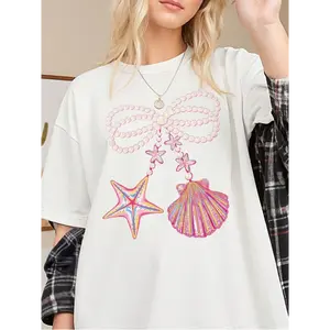 Women's Oversized Coastal Bow Graphic T-Shirt Short Sleeve Tee Pearl Starfish Shell Print Casual Streetwear Tops for Beachy Fashion Fans